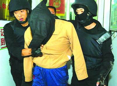 幼儿园命案疑凶旅馆被擒